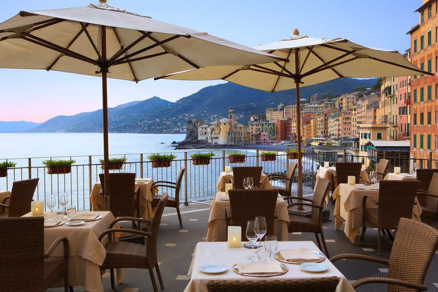 <p>Courtesy of Cenobio dei Dogi</p> The dining terrace of Cenobio dei Dogi has views of Camogli.