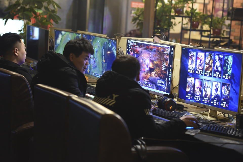 CORRECTS NUMBER OF GAMES TO 105 - People play online games in an internet cafe in Fuyang in central China's Anhui province Friday, March 1, 2019. China's authority in charge of press and publications has approved 105 online games, saying it fully supports the industry after newly proposed curbs caused massive losses for major game companies. The National Press and Publication Administration issued a statement on its Weibo social media account Monday, Dec. 25, 2023, saying the approvals demonstrate active support for the development of online games.(Chinatopix via AP)
