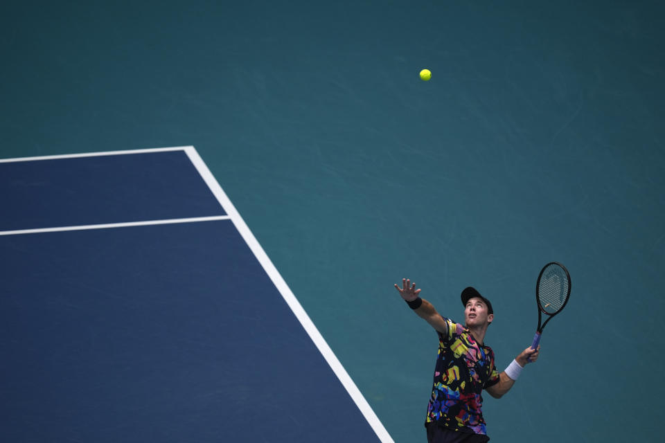 Dominik Koepfer, of Germany, serves to Daniil Medvedev in their men's singles fourth round match at the Miami Open tennis tournament, Tuesday, March 26, 2024, in Miami Gardens, Fla. (AP Photo/Rebecca Blackwell)