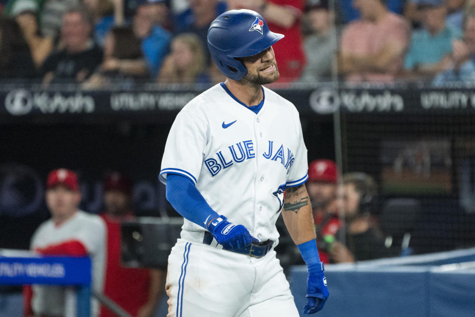 Toronto Blue Jays' Nathan Lukes reacts after being called out at home plate during the eighth inning of the team's baseball game against the Philadelphia Phillies on Tuesday, Aug. 15, 2023, in Toronto. (Nathan Denette/The Canadian Press via AP)