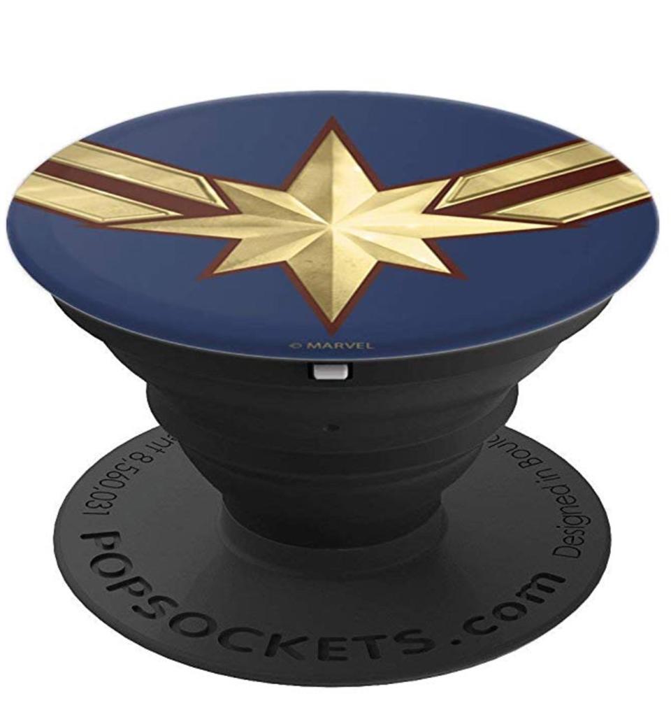 <b>Buy it! </b>Marvel Captain Marvel Movie Gold Blue Logo PopSockets Grip and Stand for Phones and Tablets, <a rel="nofollow noopener" href="https://www.amazon.com/Marvel-Captain-Movie-Gold-Blue/dp/B07M9CM79Z/ref=as_li_ss_tl?ie=UTF8&camp=1789&creative=9325&linkCode=as2&creativeASIN=B07M9CM79Z&tag=entertain07-20&ascsubtag=228a7d244ada97b69841829f5333155f" target="_blank" data-ylk="slk:$16.99 at amazon.com;elm:context_link;itc:0;sec:content-canvas" class="link ">$16.99 at amazon.com</a>