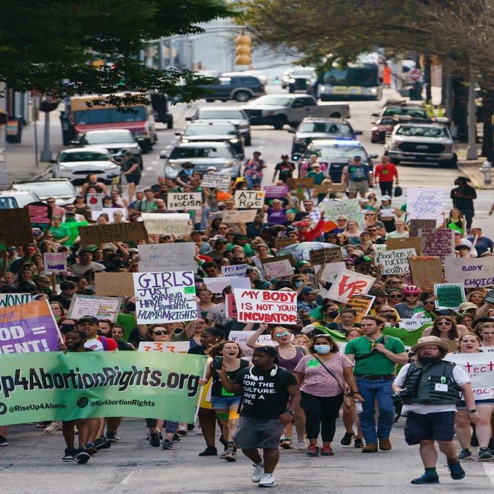 crowd of people with abortion right signs