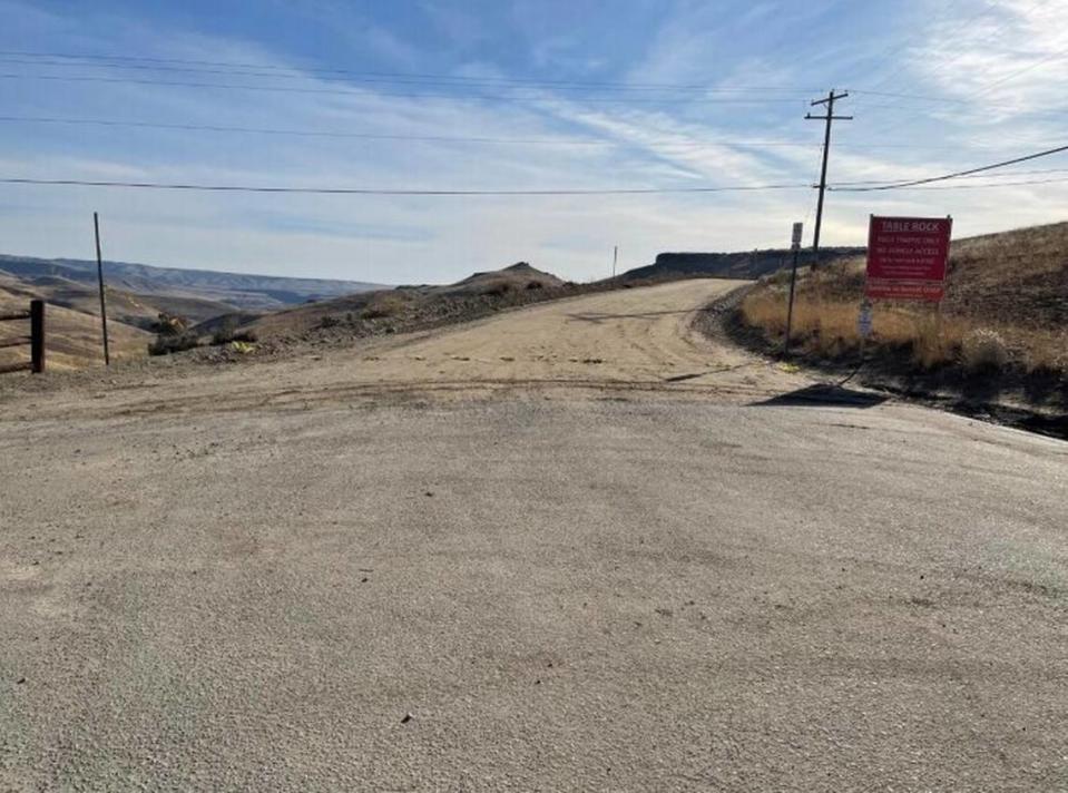 A photo shows the new location of the Table Rock Road Gate, just past the Wild Horse Lane intersection.