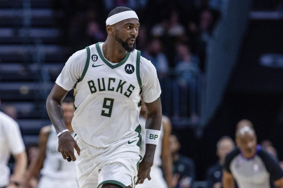 Milwaukee Bucks forward Bobby Portis (9) celebrates after a 3-point basket during the second half of the team's NBA basketball game against the Charlotte Hornets on Saturday, Dec. 3, 2022, in Charlotte, N.C. (AP Photo/Scott Kinser)