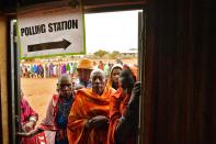 <p>Maasai voters queue at a polling station in Saikeri, Kajiado West County, Kenya on Aug. 8, 2017. (Photo: Carl de Souza/AFP/Getty Images) </p>