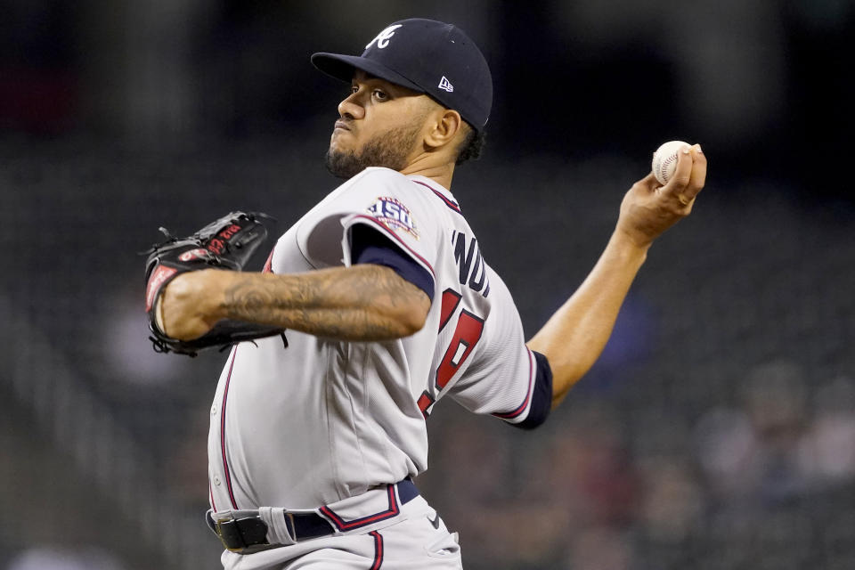 Atlanta Braves starting pitcher Huascar Ynoa throws against the Arizona Diamondbacks during the first inning of a baseball game, Monday, Sept. 20, 2021, in Phoenix. (AP Photo/Matt York)