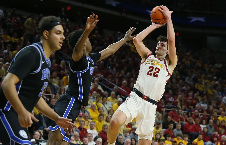 Iowa State Cyclones forward  Milan Momcilovic shoots over BYU during Wednesday's victory at Hilton Coliseum.