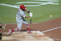 St. Louis Cardinals' Albert Pujols hits career home run No. 703 during the fifth inning of a baseball game against the Pittsburgh Pirates, Monday, Oct. 3, 2022, in Pittsburgh. (AP Photo/Keith Srakocic)