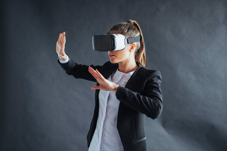 <span class="caption">In the experiment, people were asked to wear virtual reality headsets to make a moral decision within a simulation.</span> <span class="attribution"><a class="link " href="https://www.shutterstock.com/image-photo/happy-woman-on-black-background-studio-596523572?src=cey3aCNF2Xn73pyXwZQ4EA-1-25" rel="nofollow noopener" target="_blank" data-ylk="slk:Standret/Shutterstock;elm:context_link;itc:0;sec:content-canvas">Standret/Shutterstock</a></span>