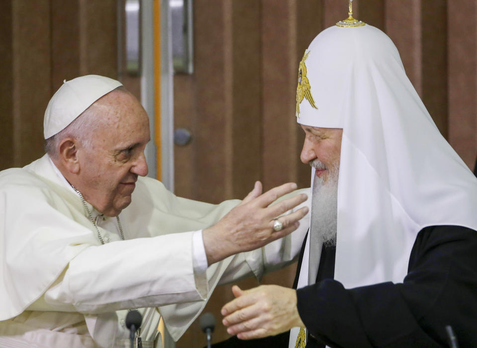 FILE — In this Friday, Feb. 12, 2016 file photo, Pope Francis, left, reaches to embrace Russian Orthodox Patriarch Kirill after signing a joint declaration at the Jose Marti International airport in Havana, Cuba. Pope Francis hasn’t made much of a diplomatic mark in Russia’s war in Ukraine as his appeals for an Orthodox Easter truce went unheeded and a planned meeting with the head of the Russian Orthodox Church was canceled. (AP Photo/Gregorio Borgia, Pool)