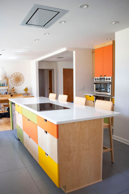 A flush-mount range hood on the ceiling over the induction cooktop.<p>Emily Fazio</p>