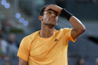 Felix Auger-Aliassime, of Canada, reacts during a final match against Andrey Rublev, of Russia, at the Madrid Open tennis tournament in Madrid, Spain, Sunday, May 5, 2024. (AP Photo/Manu Fernandez)