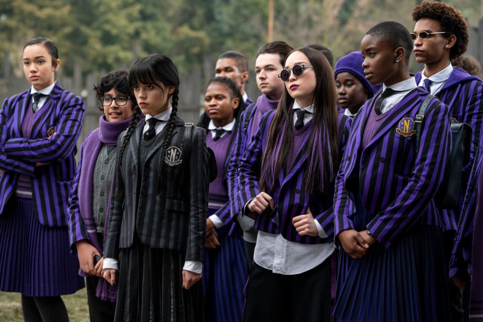 netflix wednesday l to r moosa mostafa as eugene otinger, jenna ortega as wednesday addams, naomi j ogawa as yoko tanaka, joy sunday as bianca barclay in episode 103 of wednesday cr  © 2022