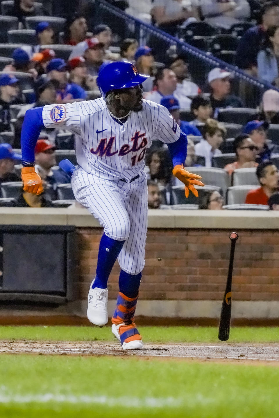 New York Mets' Ronny Mauricio runs after he singles during the first inning of a baseball game against the Cincinnati Reds, Saturday, Sept. 16, 2023, in New York. (AP Photo/Bebeto Matthews)