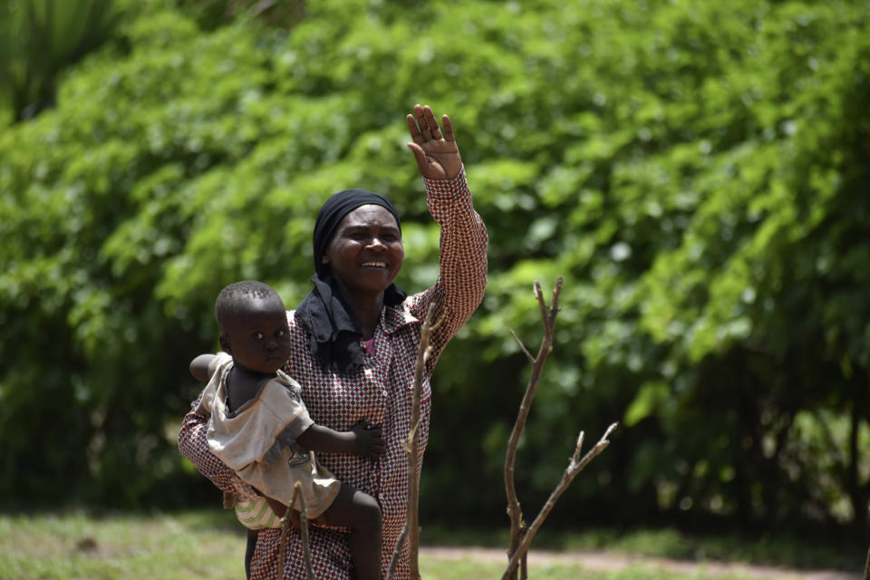 32 year old Marie Depaque, a mother of four children, gestures as she is photographed at the village of Binmar, Chad, Friday, July 19, 2024. (AP Photo/Robert Bociaga)