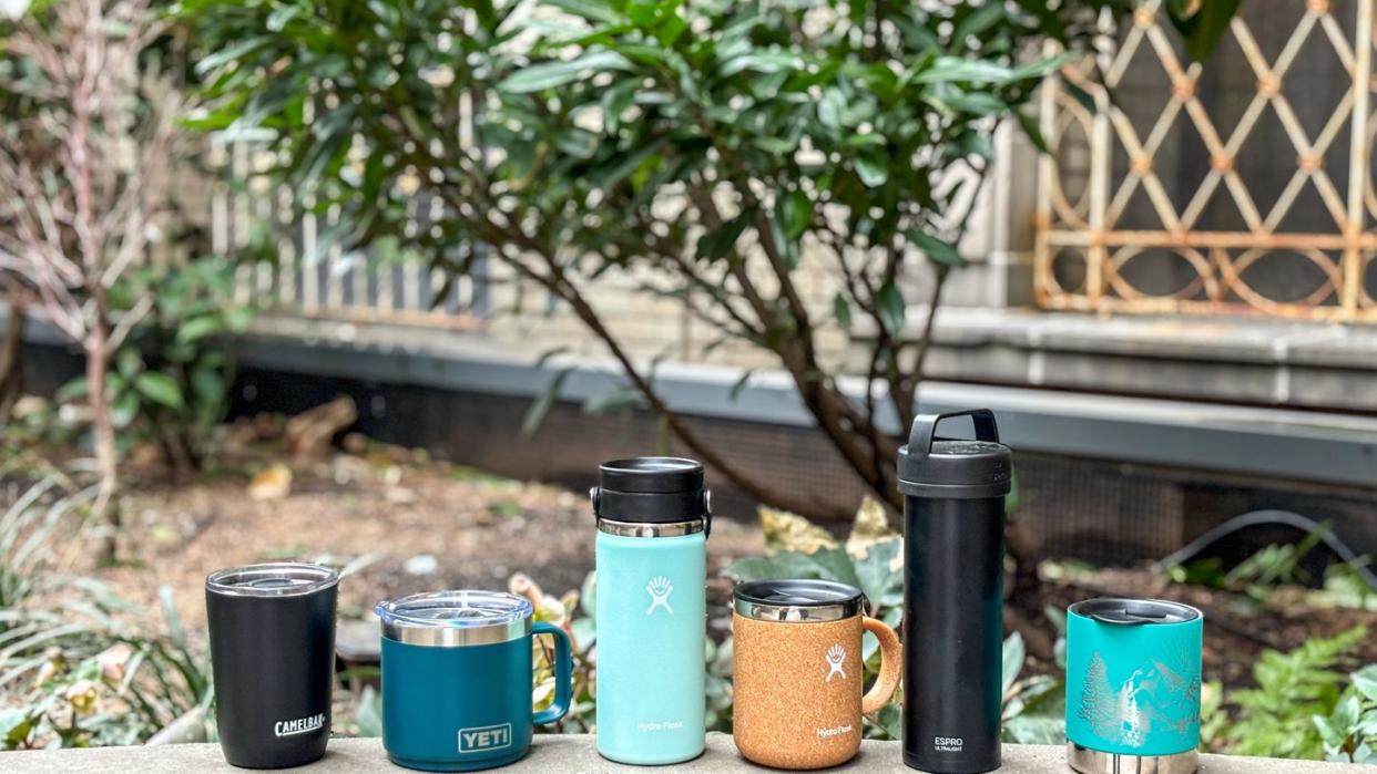 a group of coffee cups and cans