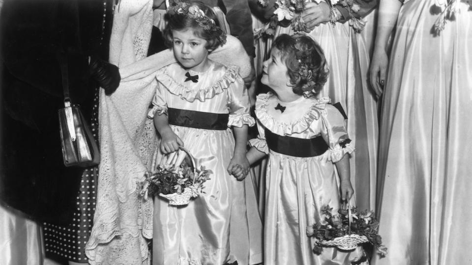1952: Camilla as a flower girl at a wedding
