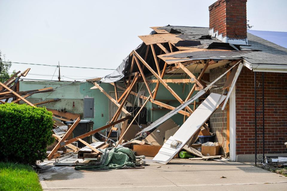 Volunteer groups and residents worked together Saturday, June 1 to clear debris from some of the neighborhoods in Trotwood and other areas hit by the tornado. WHIO File