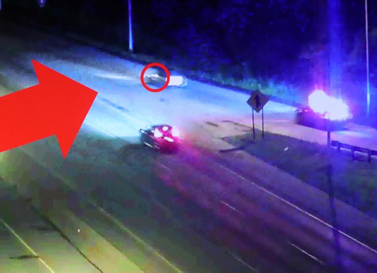 This still image is presented during the press conference at the Firestone Community Center on Sunday, July 3, 2022 in Akron regarding the police shooting of Jayland Walker. The Akron Police Department has circled what they believe to be a flash of light from a discharged gun on the car that Jayland Walker is driving.
