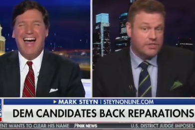 Tucker Carlson: Fox News host laughs along with guest after he suggests black people ‘need to move on’ from slavery