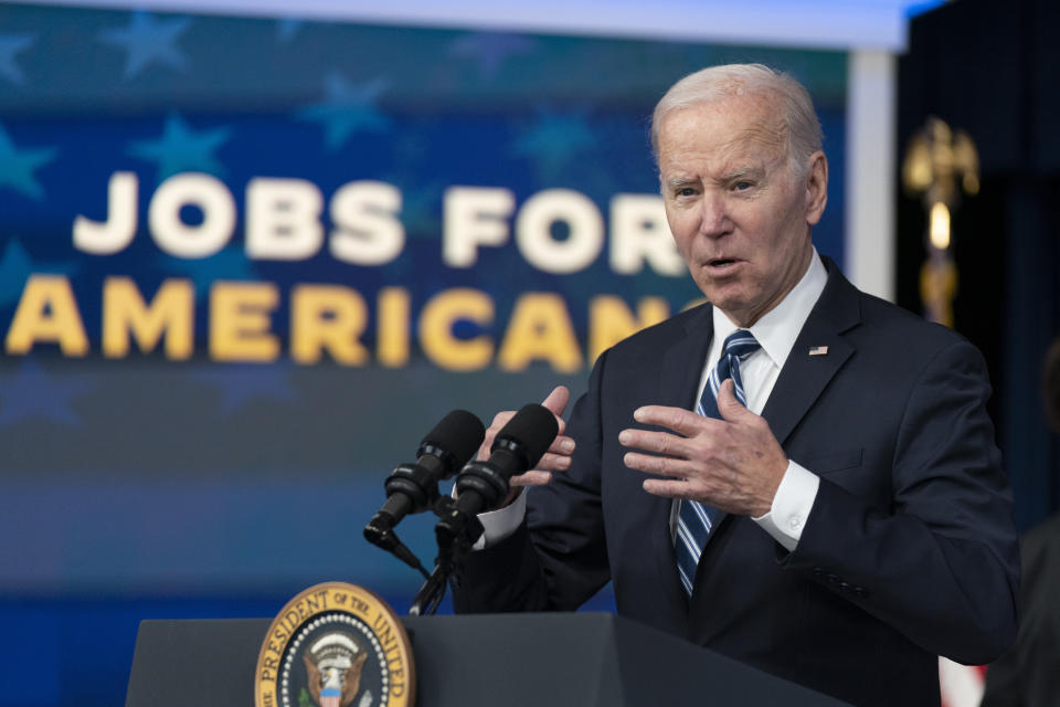 FILE - President Joe Biden speaks on the January jobs report in the Eisenhower Executive Office Building on the White House complex, Friday, Feb. 3, 2023, in Washington. Going into Tuesday's State of the Union address, Biden sees a nation with its future aglow. Republicans take a far bleaker view. (AP Photo/Manuel Balce Ceneta, File)