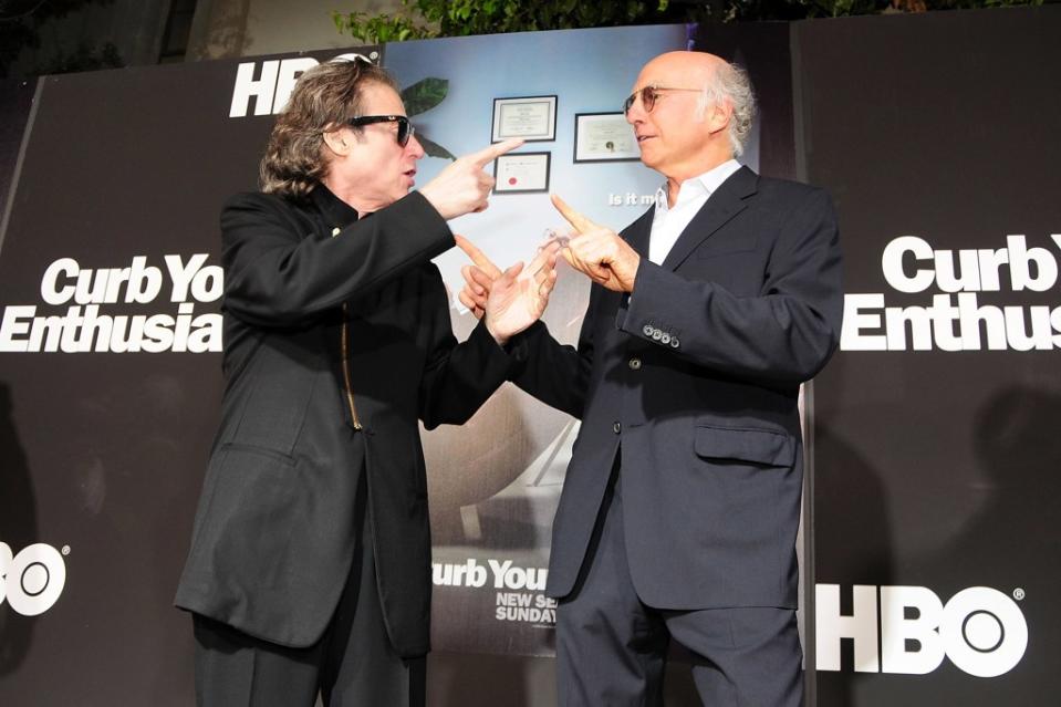 “He had that rare combination of being the funniest person and also the sweetest,” Larry David (right) said about Richard Lewis. FilmMagic