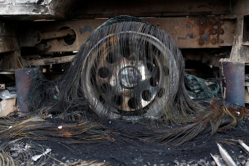 The remains of a tire of a bus burned during a protest after Bolivia's President Evo Morales announced on Sunday that he was resigning are seen in La Paz