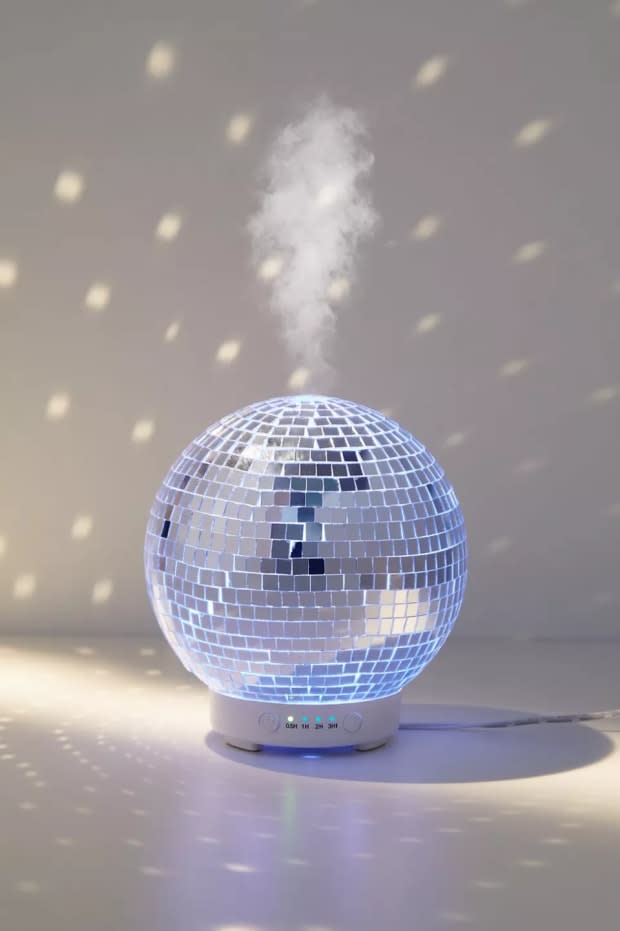 <p>Urban Outfitters Disco Ball Essential Oil Diffuser, $79, <a href="https://rstyle.me/+EzxArN3oCRlS1qmykA1ujQ" rel="nofollow noopener" target="_blank" data-ylk="slk:available here;elm:context_link;itc:0;sec:content-canvas" class="link ">available here</a></p>