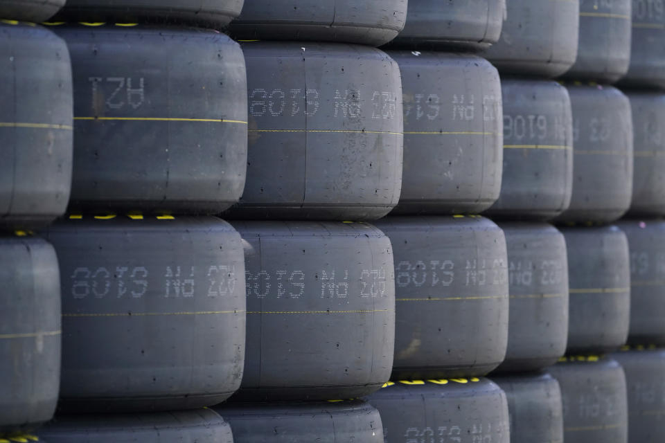 Tires are seen stacked up before practice for Saturday's NASCAR Truck Series auto race at Pocono Raceway, Friday, July 22, 2022, in Long Pond, Pa. (AP Photo/Matt Slocum)