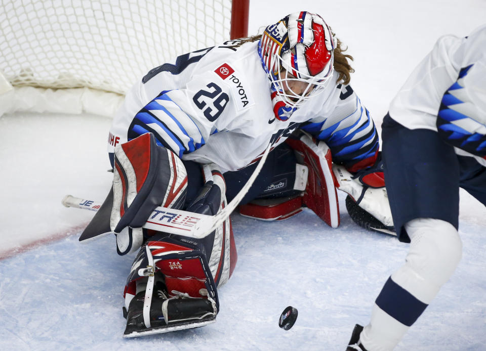 U.S. goalie Nicole Hensley blocks a Canada shot during the second period of the IIHF hockey women's world championships title game in Calgary, Alberta, Tuesday, Aug. 31, 2021. (Jeff McIntosh/The Canadian Press via AP)