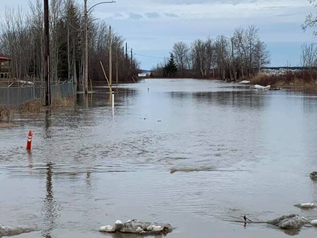 A road flooded in Fort Simpson, N.W.T, on Saturday May 8, one day before a general evacuation was called for the town. 