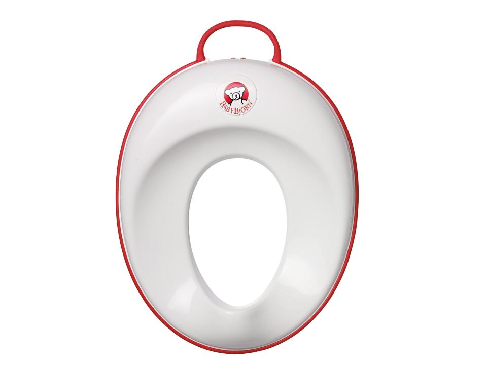 This product image released by BabyBjörn shows the Toilet Trainer, a potty training seat that adjusts to fit on a toilet seat. For some parents, summertime is potty training time. And like so many aspects of life with kids, potty training means gear, lots of gear. The choices in potty seats and chairs proliferated and sprouted all manner of bells and whistles. (AP Photo/BabyBjörn)