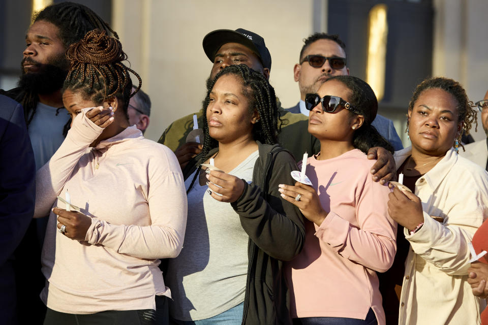 The family of Michael Hill during a candlelight vigil for the Covenant School shooting victims