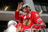 Jun 18, 2015; Chicago, IL, USA; Chicago Blackhawks left wing Patrick Sharp (10) acknowledges the crowd during the 2015 Stanley Cup championship parade and rally at Soldier Field. Mandatory Credit: Jon Durr-USA TODAY Sports