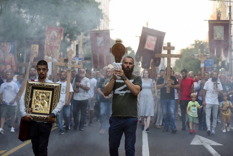 People march during a protest against the international LGBT event Euro Pride in Belgrade