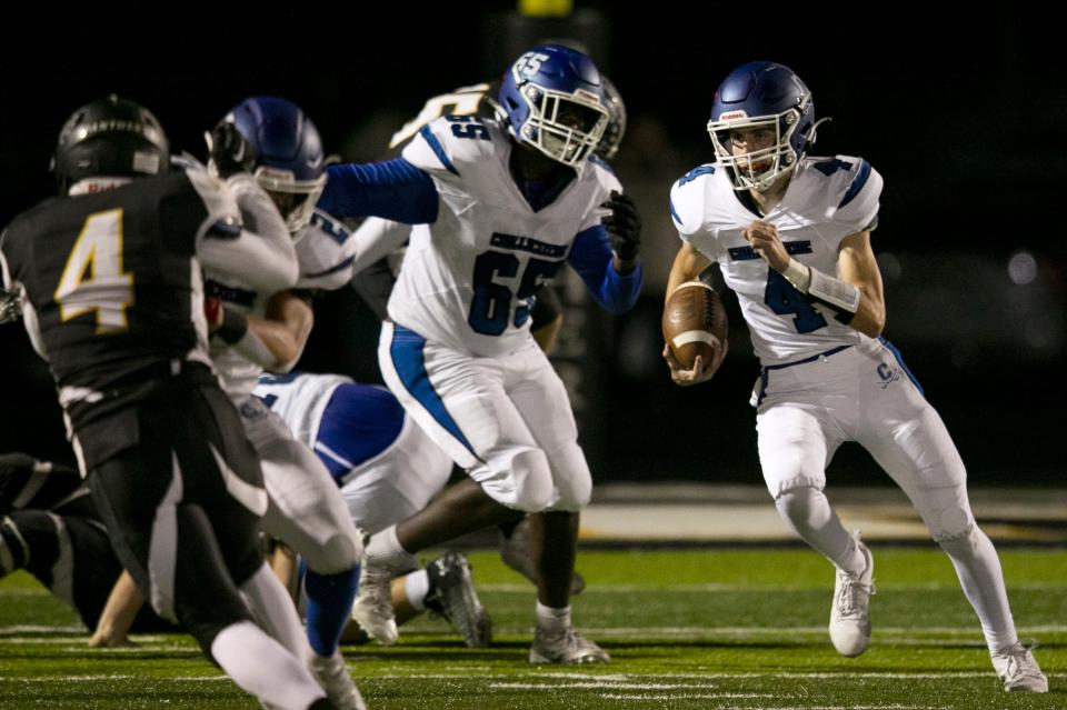 Chillicothe's quarterback Caden Eblin (4) runs the ball down the field against Miami Trace defense at Miami Trace High School in Friday night football action on October 6, 2023, in Washington Court House, Ohio.