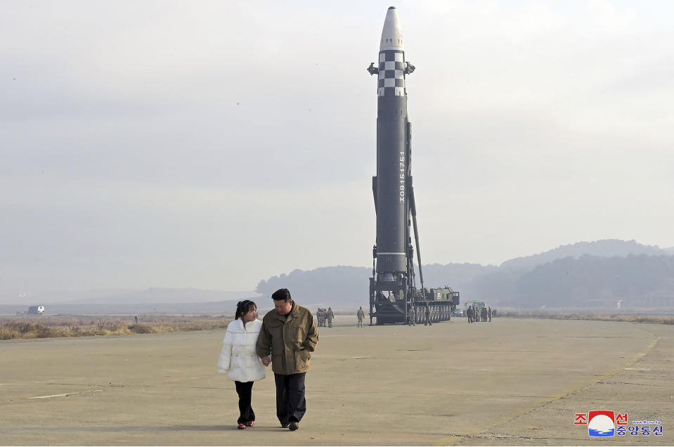 FILE - This photo provided on Nov. 19, 2022, by the North Korean government shows North Korean leader Kim Jong Un, right, and his daughter at the site of a missile launch at Pyongyang International Airport in Pyongyang, North Korea, Friday, Nov. 18, 2022. Independent journalists were not given access to cover the event depicted in this image distributed by the North Korean government. The content of this image is as provided and cannot be independently verified. Korean language watermark on image as provided by source reads: "KCNA" which is the abbreviation for Korean Central News Agency. (Korean Central News Agency/Korea News Service via AP, File)