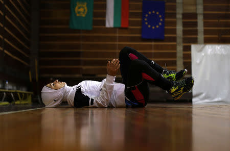 Iranian volleyball player Zeinab Giveh relaxes after a training session of "Shumen" volleyball club in Shumen, Bulgaria January 14, 2017. Picture taken on January 14, 2017. REUTERS/Stoyan Nenov