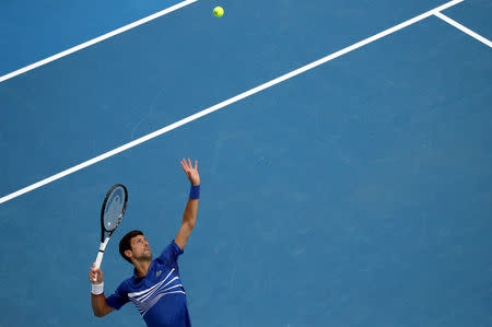 Tennis - Australian Open - First Round - Melbourne Park, Melbourne, Australia, January 15, 2019. Serbia’s Novak Djokovic in action during the match against Mitchell Krueger of the U.S. REUTERS/Lucy Nicholson