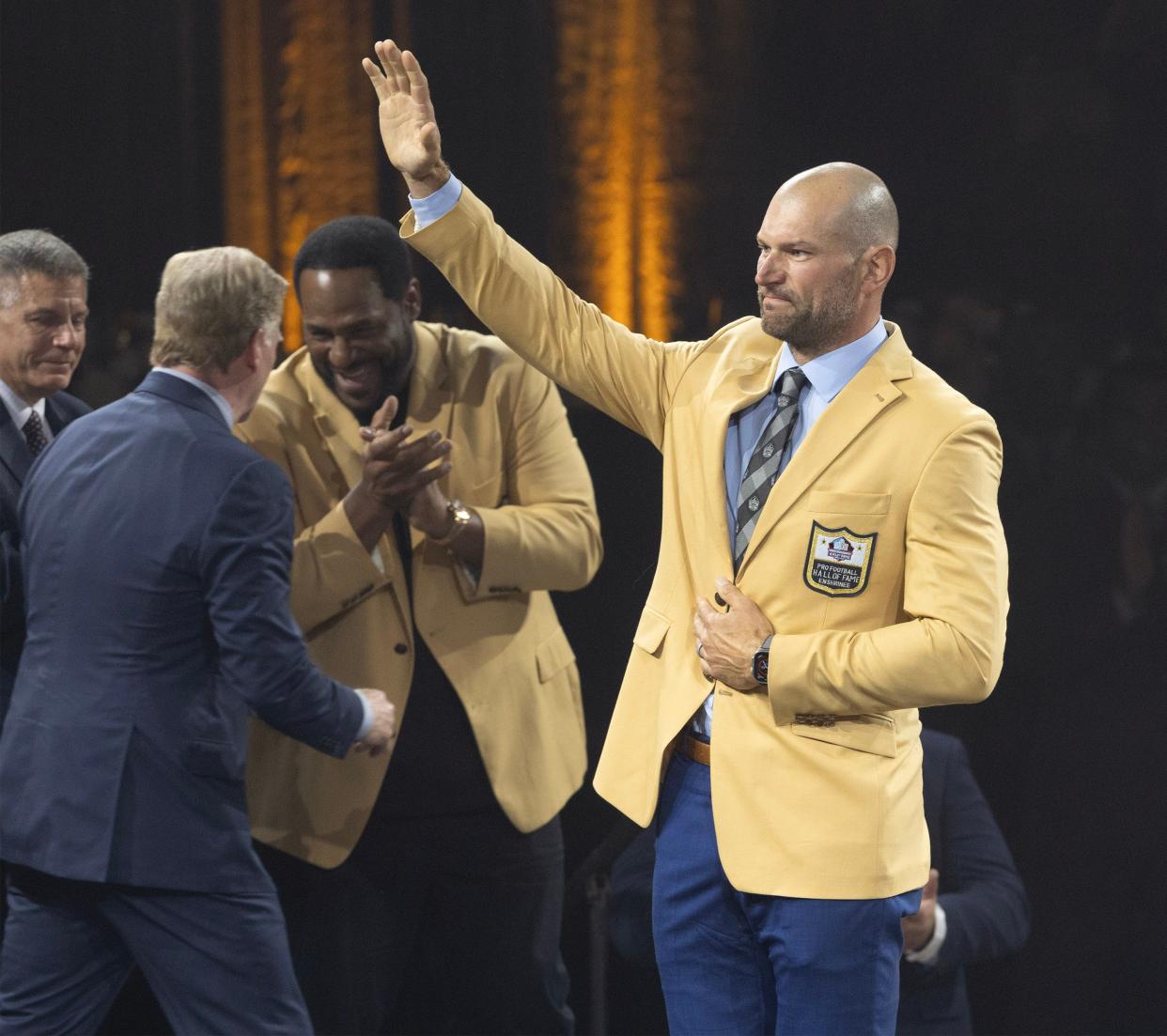 Joe Thomas waves to fans at the Gold Jacket Dinner on Friday in Canton.