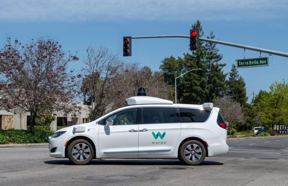 <div class="inline-image__caption"><p>A robot car from Google’s sister company Waymo on the road in Mountain View.</p></div> <div class="inline-image__credit">Andrej Sokolow/picture alliance via Getty</div>