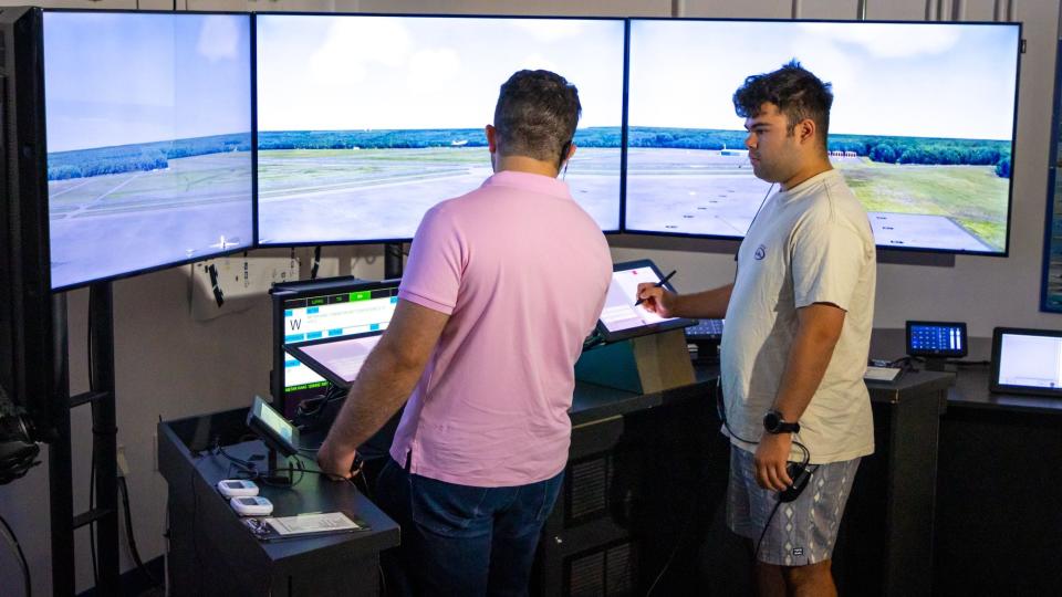Ander Turueno Garcia and Alejandro Jaramillo practice their communication skills during air traffic control training at Embry-Riddle Aeronautical University in May, 2024.