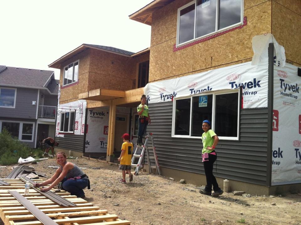 Habitat for Humanity volunteers build a duplex in Kamloops, B.C.