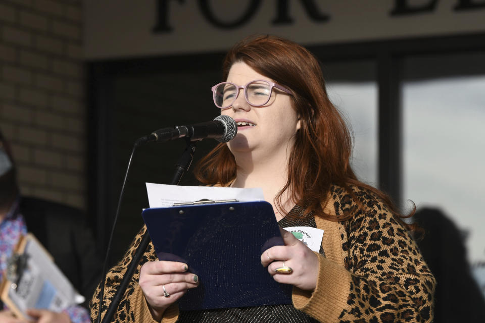 Wesleyan University Media Specialist Alex Sharp speaks during the McMinn County Neighbors press conference, Thursday, Feb. 10, 2022, in Athens, Tenn. The McMinn County School Board heard from concerned citizens about the removal of the Pulitzer Prize-winning graphic novel about the Holocaust "Maus," from the district's curriculum at their meeting on Thursday. (Robin Rudd/Chattanooga Times Free Press via AP)