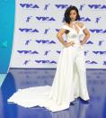 <p>After a breakout year with the release of “Bodak Yellow,” Cardi B wowed in this white jumpsuit with a cone-bra detail.</p>