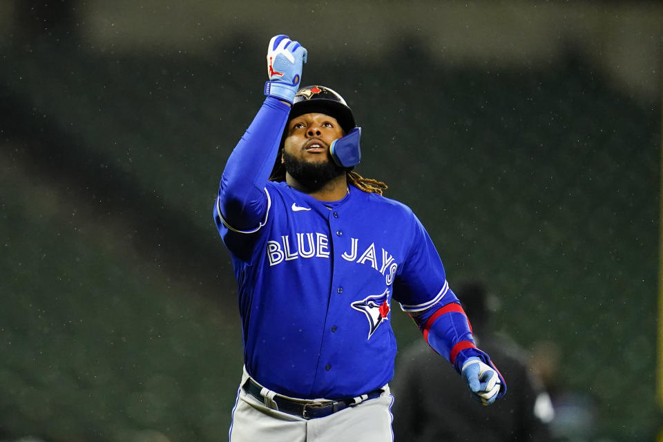 Toronto Blue Jays' Vladimir Guerrero Jr. reacts after hitting a solo home run against the Baltimore Orioles during the third inning of a baseball game, Monday, Oct. 3, 2022, in Baltimore. (AP Photo/Julio Cortez)