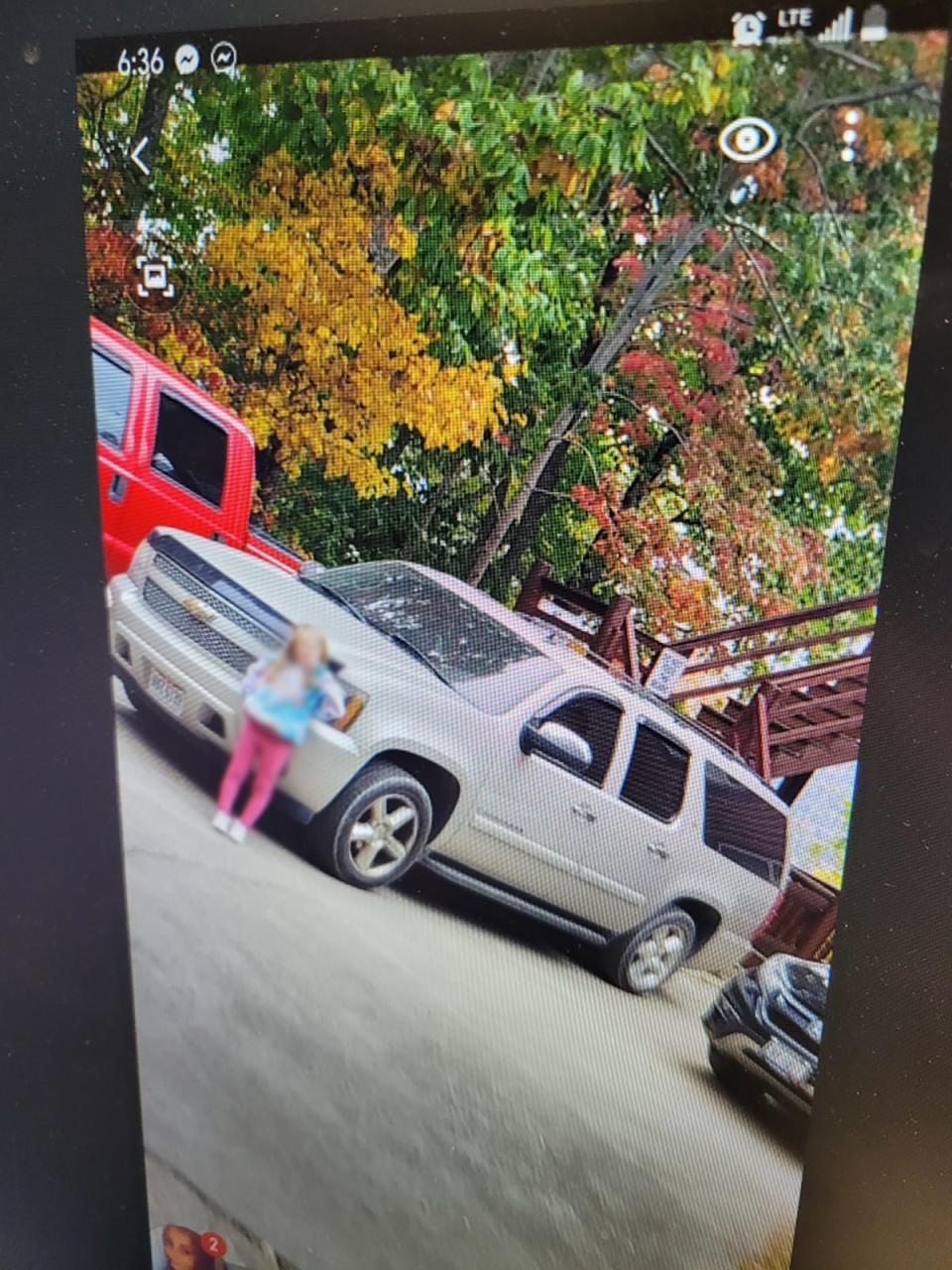 An amber alert has been issued for two boys who were in the pictured vehicle, which was stolen in downtown Zanesville. A child unrelated to the case has been blurred out.