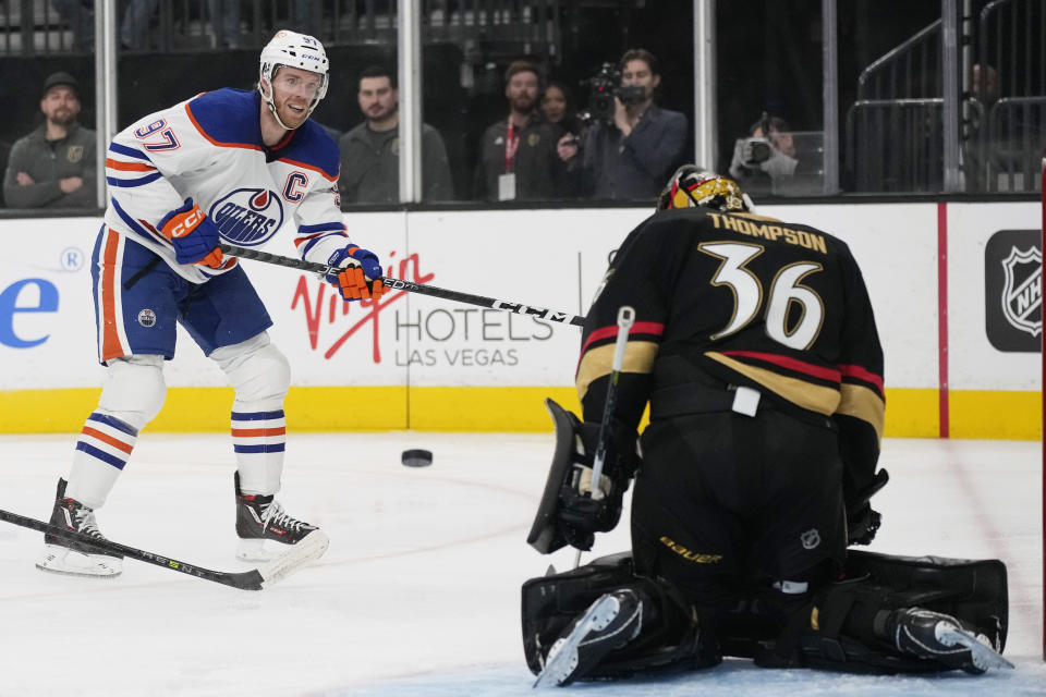 Edmonton Oilers center Connor McDavid (97) shoots on Vegas Golden Knights goaltender Logan Thompson (36) during the first period of an NHL hockey game Saturday, Jan. 14, 2023, in Las Vegas. (AP Photo/John Locher)