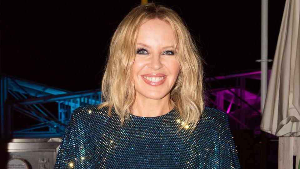 Kylie Minogue in blue sequin dress