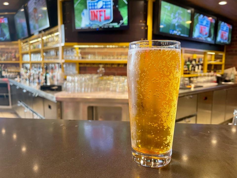 glass of beer on table